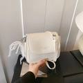Elegant cream white crossbody bag with wrinkled leather texture and pearl lace charm - White with Pendant