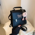 Black PU leather backpack featuring pink butterfly embroidery and a plush monster charm - Black With Pendant