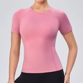 T-shirt de yoga moulant rose poudré pour femme avec manches raglan et col rond - S / Rose Pétale