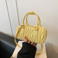 Glossy yellow quilted crossbody bag with golden hardware and round top handles - Light Yellow