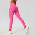 High-waisted bright pink yoga leggings with white trim and peach scrunch butt detail - S / Rose Red