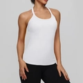 Sleek white racerback sports bra with built-in pads and tight compression fit - White
