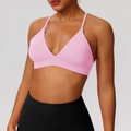 Light pink sports bra with thin cross straps and V-neckline for yoga fitness - Begonia Pink