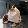 Lavender purple minimalist backpack with beige trim and compact stylish commuting design - Light Coffee
