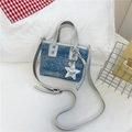 Blue denim bucket bag with silver glitter trim, star charm, and long strap - Blue with Charm