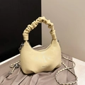 Light yellow crescent handbag featuring a ruched cloud handle and metallic chain strap - Yellow Without Pendant