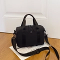 Black minimalist nylon Boston bag with DD logo and adjustable wide woven shoulder strap - Black