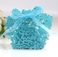 Detailed laser-cut floral pattern on blue wedding gift box with ribbon bow - Tiffany Blue