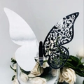 Macro detail of golden butterfly glass card showing laser-cut patterns and glossy finish - Reflective Silver