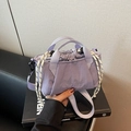 Versatile lavender nylon bucket bag with drawstring closure and adjustable strap - Purple