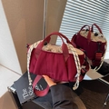 Chic burgundy drawstring bucket bag in nylon with stylish rope handle and crossbody strap - Red
