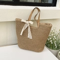 Brown woven straw tote bag with large white lace bow and faux leather shoulder straps - Khaki