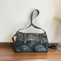 Minimalist black crossbody bag with bow details and wrinkled faux leather texture - Black