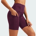 Pantalones cortos de yoga de cintura alta morado oscuro con bolsillos laterales y tejido elástico - S / Burdeos