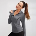 Top sportivo grigio da donna con collo alto a zip e asole per i pollici per la corsa - S / Grigio Melange