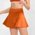 High-waisted bright orange tennis skirt in stretchy fabric with A-line design - S / Bottoms / Orange