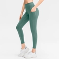 Pantaloni da yoga verde scuro a vita alta con tasche laterali e vestibilità slim - S / Verde Mistero