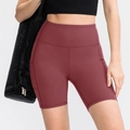 Dames yoga shorts met hoge taille in bordeauxrood met zijzakken en matte stretchstof - Mystiek Bruin