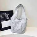 Minimalist light grey nylon tote bag with multi-pocket design and wide shoulder straps - Off-White