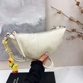 Chic off-white croissant shoulder bag in litchi grain leather with cute duck charm - Cream White With Charm