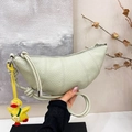 Chic mint green crescent bag in lychee leather with a cute yellow duck pendant - Bean Paste Green with Pendant