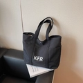 Borsa tote in tela nera con scritte KFR e tasca laterale per il pendolarismo - Nero