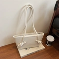 Cream-colored shoulder bag with twisted knot handles and smooth glossy finish - White