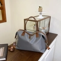 Large grey nylon travel tote bag with brown leather handles and adjustable shoulder strap - Large / Gray