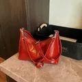 Glossy red oil wax leather shoulder bag with silver M logo and adjustable straps - Red (No Pendant)