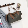 Large dark green tote bag with brown leather trim and handles for daily travel - Small / Green