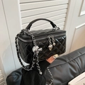 Elegant black quilted handbag with silver chain strap and decorative heart pendant - Black