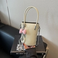 Chique crème bucket bag met roze geruite strik, parelhanger en zilveren ketting - Met Hanger / Bonengroen