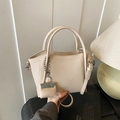 Cream lychee leather handbag with silver hardware and a matching mini pouch charm - Beige