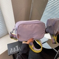 Light purple nylon camera bag with embroidered text and wide jacquard shoulder strap - Purple