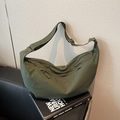 Minimalist dark green nylon dumpling bag with adjustable strap and multi-zipper design - Green