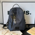 Zaino da viaggio in nylon grigio scuro impermeabile con ciondolo a orso e multitasche - Con Ciondolo / Nero e Grigio