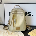 Zaino da viaggio in nylon beige impermeabile con ciondolo a orso e cinghie - Con Ciondolo / Cachi