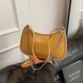 Amber yellow leather baguette bag with dual shoulder straps and a metallic chain finish - Khaki
