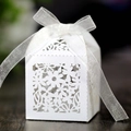 Laser cut hollow wedding candy gift box in pearl white with ribbon bow and flower patterns - White