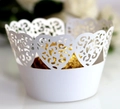 Close-up of white laser-cut cupcake wrapper with elegant heart lace pattern - 5cm / White