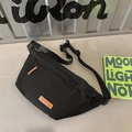 Minimalist black large capacity crossbody bag with brown leather details and nylon strap - Black
