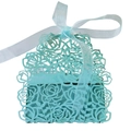 Close-up of laser-cut rose patterns on a mint blue wedding candy box with ribbon - Teal Blue