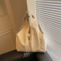 Chic off-white canvas tote bag with spacious design for casual commuting style - Off-white