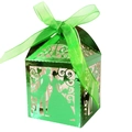 Detail of green laser-cut wedding favor box with bride and groom silhouette and ribbon - Reflective Green