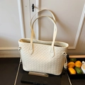 Large cream woven tote bag in Intrecciato style with dual shoulder straps and zipper - White