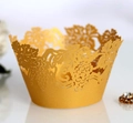 Dettaglio dei pirottini per cupcake dorati tagliati al laser con motivi di vite - 5cm / Oro