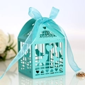 Tiffanyblaue lasergeschnittene Vogelkäfig-Bonbonschachtel mit passender Satinschleife - Tiffany-Blau