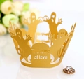 Macro shot of gold pearlescent laser-cut ghost cake wrapper with The tomb of love text - 5cm / Gold