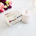 Detailed view of silver laser-cut paper candle wrap with intricate vine and leaf patterns - Reflective Silver