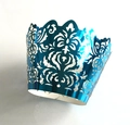 Laser cut electric blue cupcake wrappers with ornate hollow vine patterns for weddings - Reflective Blue